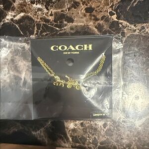 Coach Gold Carriage Pendant Necklace